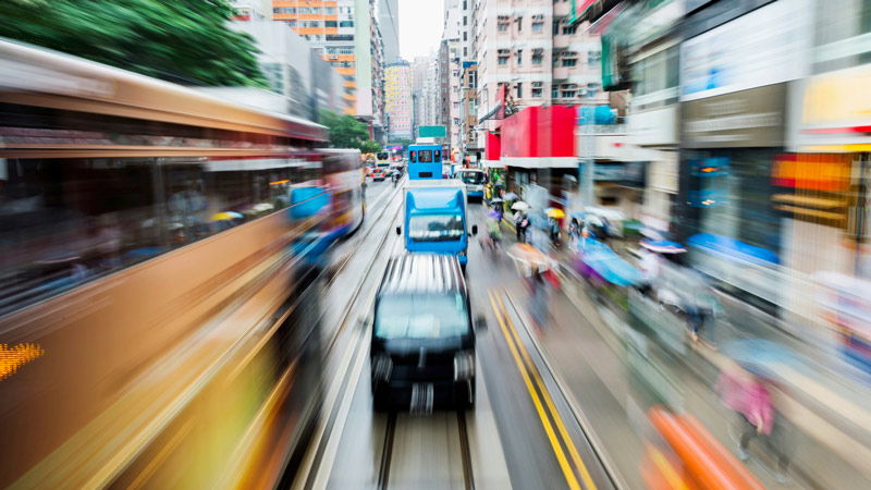 Blurry cars and tramway