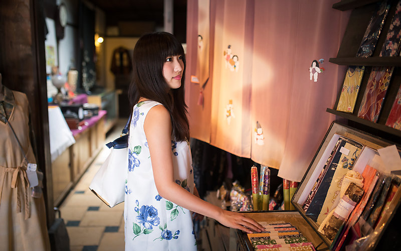 Young woman shopping in a traditional Japanese retail store